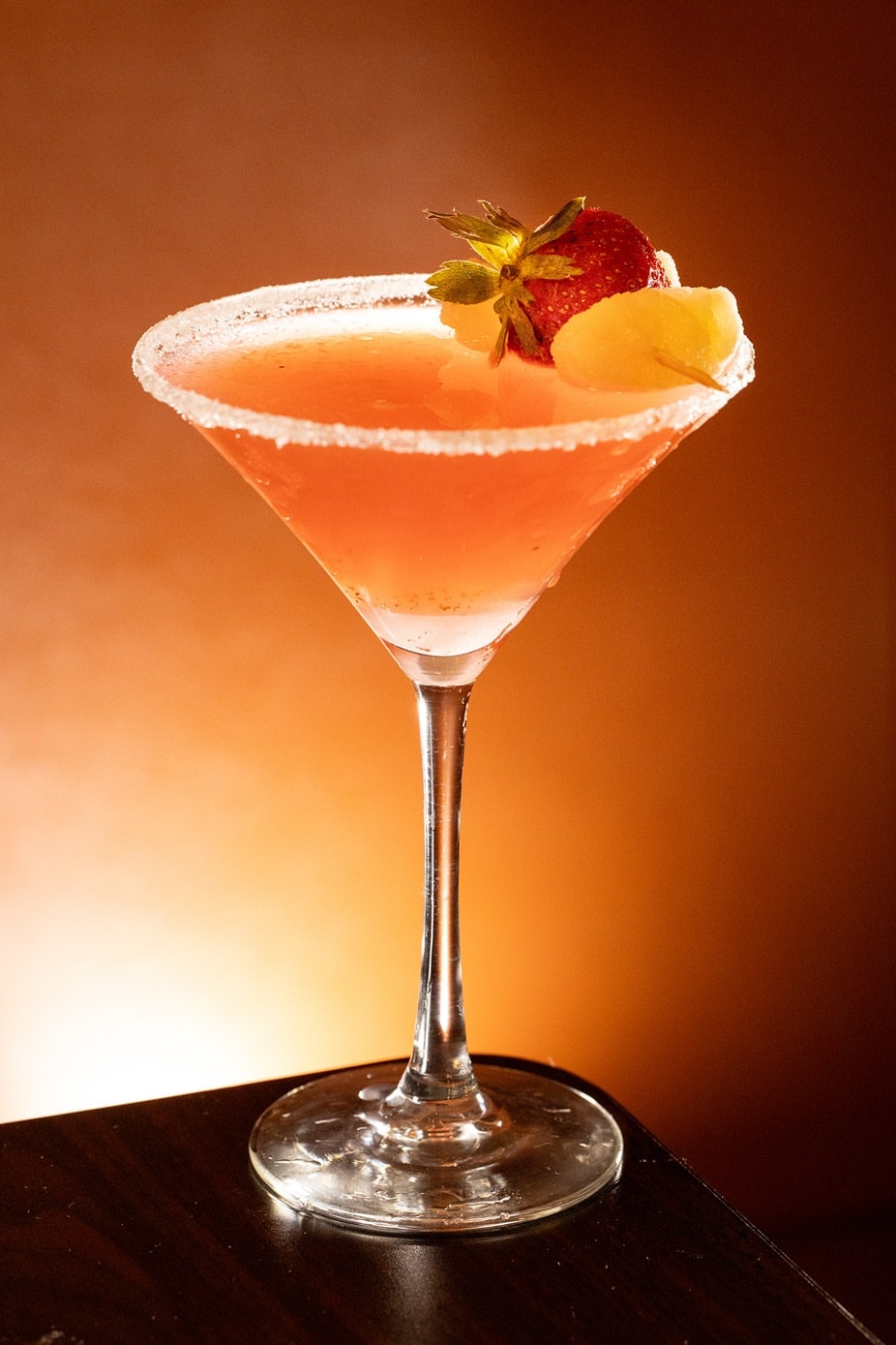 Pink and orange martini cocktail at Friday Night Dinner